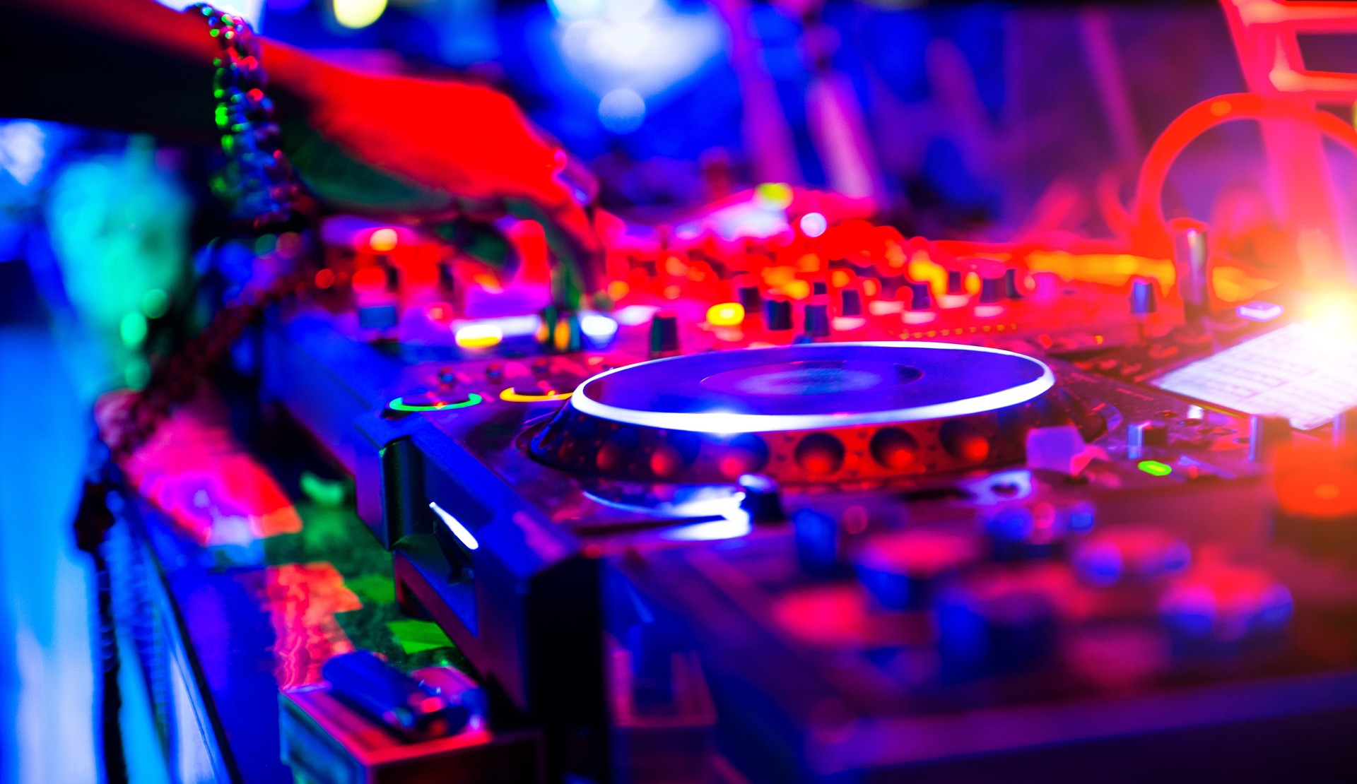 Dj mixing at nightclubs and music festivals